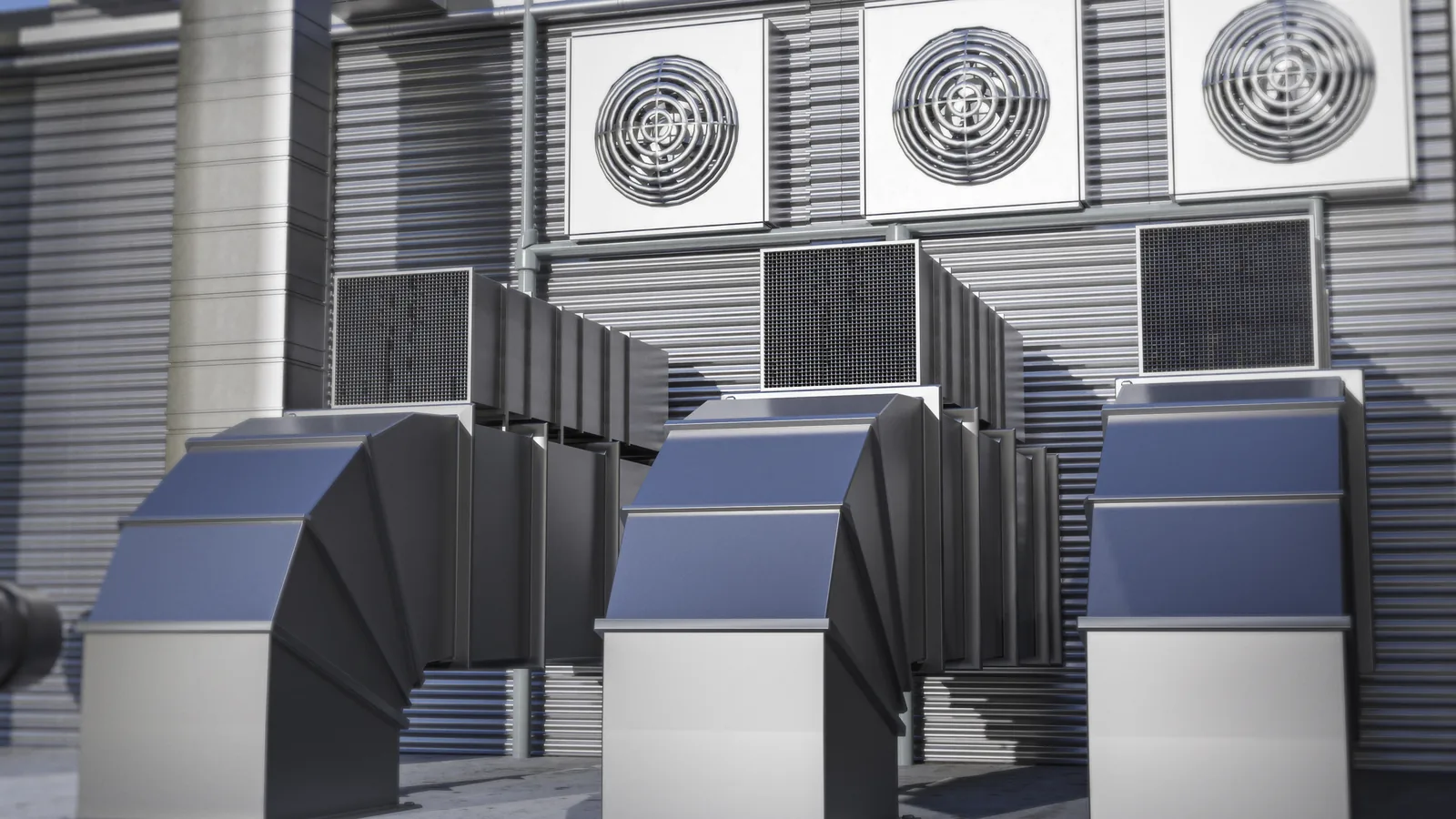 Large ventilation and plant equipment inside a building services room